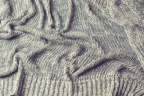 Knitted texture background grey top view flat Stock Photos