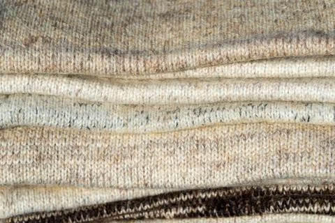 Knitted texture. Pattern fabric made of wool Stock Photos