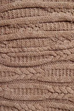 Knitted texture. Pattern fabric made of wool. Background Stock Photos