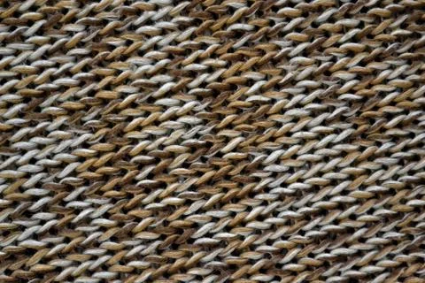 Knitted texture pattern melange in dark brown tones. Fashionable concept. Stock Photos