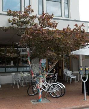 Knitted tree with bikes Stock Photos