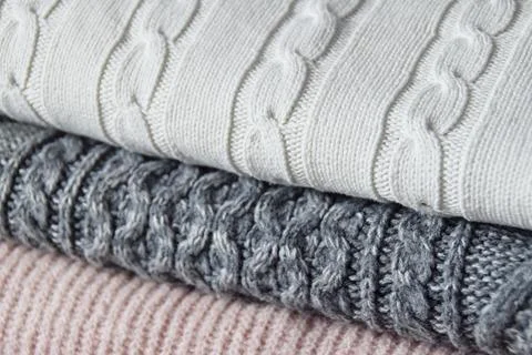 Knitted, warm sweaters Stock Photos