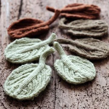 Knitted winter leaf Stock Photos