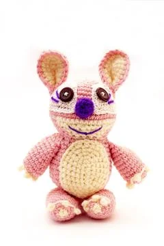 Knitted wool alien on a white background Stock Photos