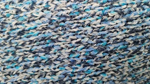 Knitted wool background made of melange yarn Stockbeeldmateriaal 168912443