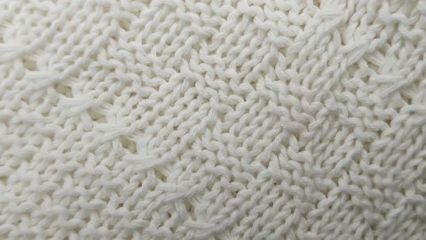 Knitted wool background made of white yarn Stock Footage 168912408