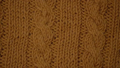 Knitted Wool background. Merino wool ocher color, macro shoot. Woolen fabric Video stock 138877501
