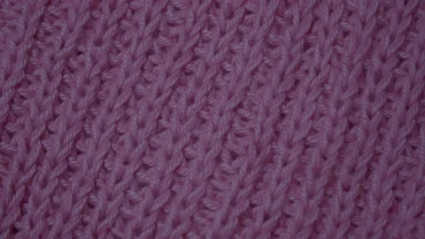 Knitted Wool background. Merino wool violet color, macro shoot. Woolen fabric Stock Footage 138877594