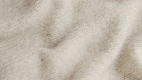Knitted wool cloth or warm fluffy sweater. Handcraft knitting woolen Stock Footage 160126428