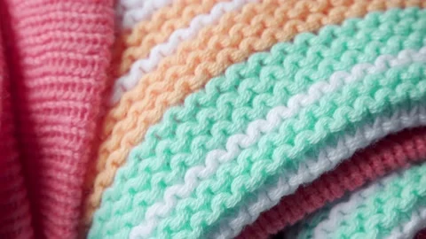 Knitted wool pattern texture extreme close up rotating very slowly  Stock Footage 130577290