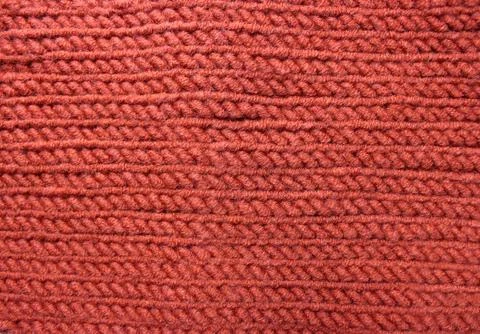 Knitted wool red background Stock Photos