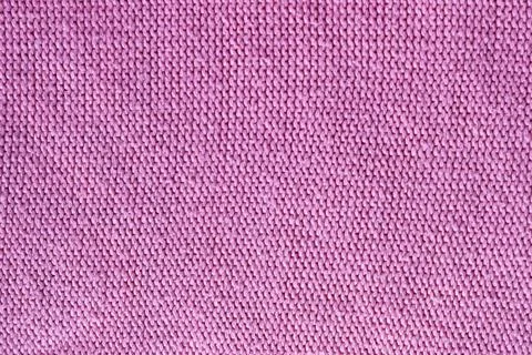 Knitted wool texture. Knitted background. Pink knitted background. Stock Photos