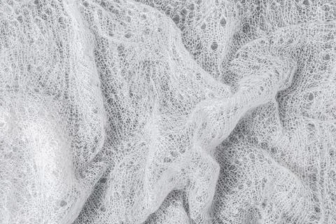 Knitted woolen lace texture background. Abstract background with copy space 库存照片