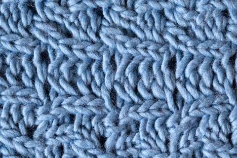 Knitted woolen textured surface, macro. Soft grey blue merino wool pattern ba Stock Photos