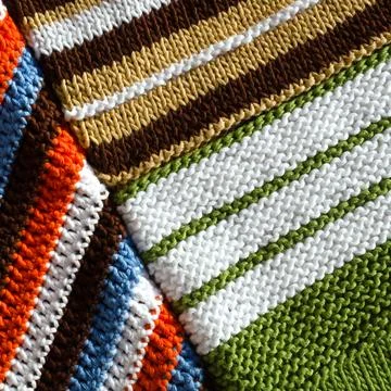 Knitting and crocheting, pattern from multi-colored cotton threads, double .. Stock Photos