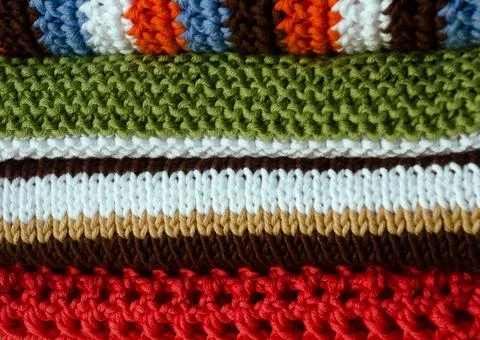 Knitting and crocheting, pattern from multi-colored cotton threads, double .. Stock Photos