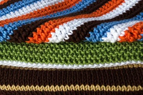 Knitting and crocheting, pattern from multi-colored cotton threads, double .. Stock Photos