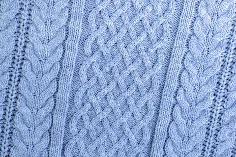 Knitting and needlework: patterned knitted fabric, short focus Stock Photos