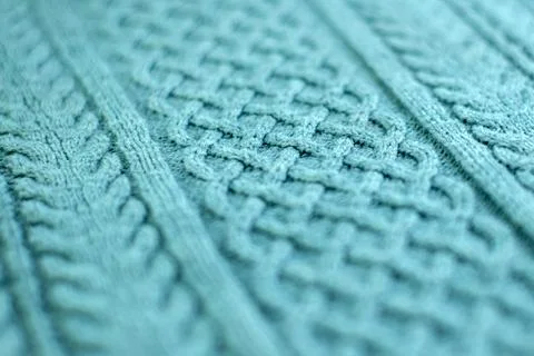Knitting and needlework: patterned knitted fabric, short focus Stock Photos