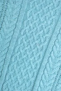 Knitting and needlework: patterned knitted fabric, short focus Stock Photos