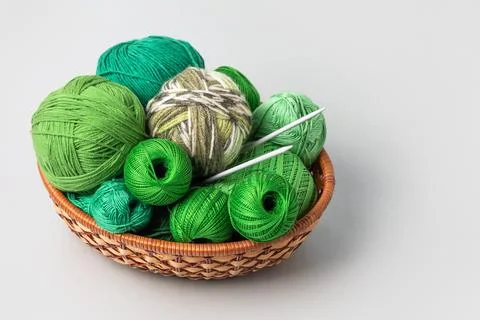 Knitting balls in basket Stock Photos