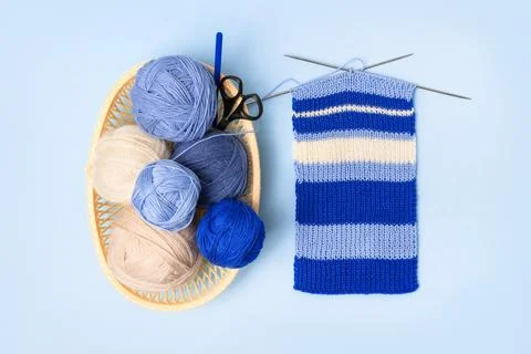 Knitting balls in basket Stock Photos