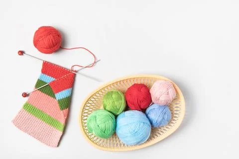 Knitting balls in basket Stock Photos