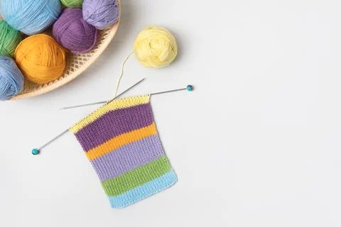 Knitting balls in basket Stock Photos