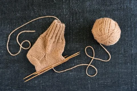 Knitting on black background Stock Photos