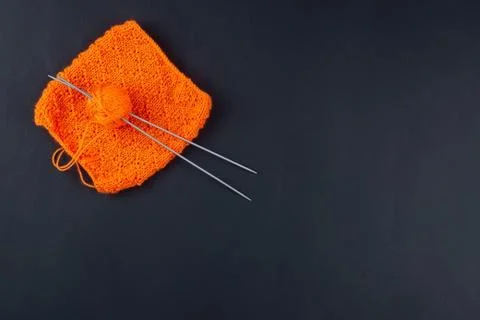 Knitting on a black background Stock Photos
