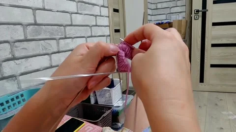 Knitting clothes from woolen threads. Stock Footage 248891855