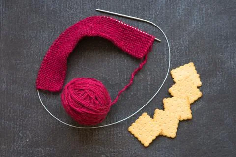 Knitting with a cup of coffee Stock Photos