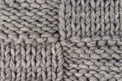 Knitting. Gray knitted pattern background or knit fabric texture background Stock-Fotos