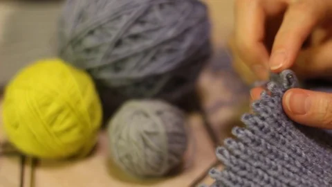 Knitting hands threads on spokes Stock Footage 71318431