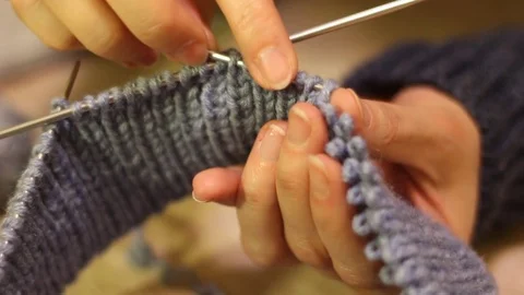 Knitting hands threads on spokes Stock Footage 71361444