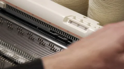 Knitting machine close-up. Knitted clothes handmade Video stock 218388734