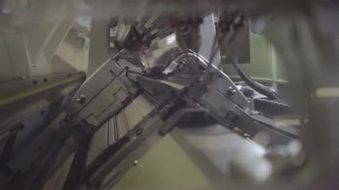 Knitting machine moves back and forth to shape sweater, industry slow Stock Footage 152864885