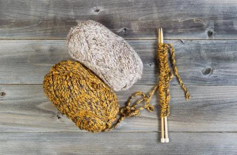 Knitting materials on rustic wood Stock-Fotos