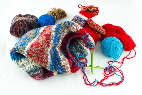 Knitting needles and balls of threads Stock Photos