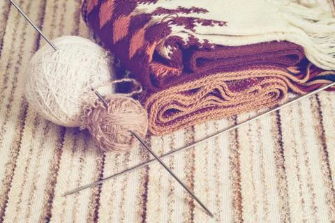 Knitting needles and yarn on rustic Stock Photos