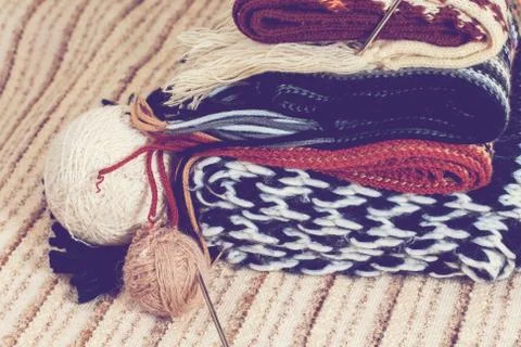 Knitting needles and yarn on rustic Stock Photos