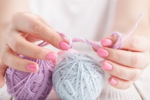 Knitting on the old board Stock Photos