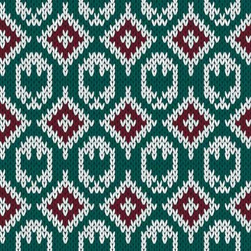 Knitting ornate seamless pattern in red, green and white colors 库存插图