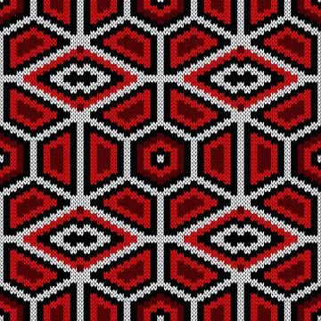 Knitting ornate seamless pattern in red, black and white colors Illustrazione stock