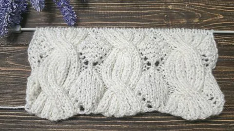Knitting patterns and details for sweaters, hats, and other crocheted items. Stock Photos