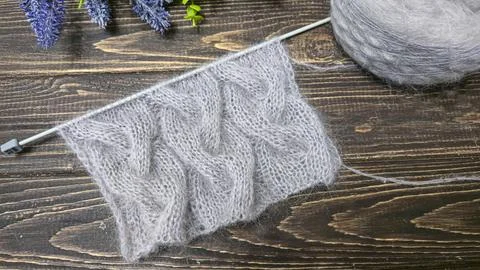 Knitting patterns and details for sweaters, hats, and other crocheted items. Stock Photos