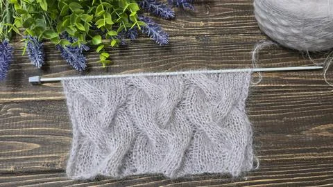 Knitting patterns and details for sweaters, hats, and other crocheted items. Stock Photos
