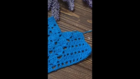 Knitting patterns with a raised pattern and yarn in different colors. texture. Stock Footage 335865589
