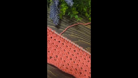 Knitting patterns with a raised pattern and yarn in different colors. texture. Stock Footage 335865644