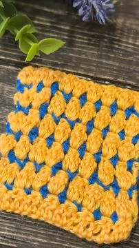 Knitting patterns with a raised pattern and yarn of different colors Stock Photos